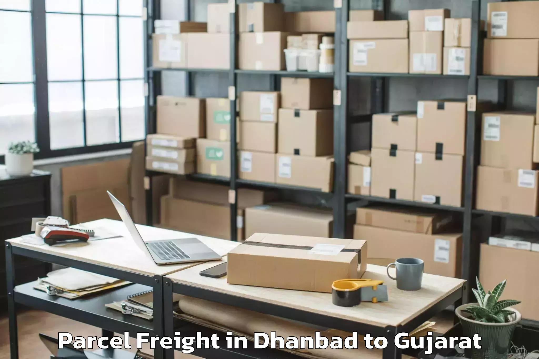 Quality Dhanbad to Ghoghamba Parcel Freight